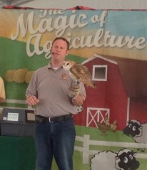 Jason Caldwell holds a Barn Owl.